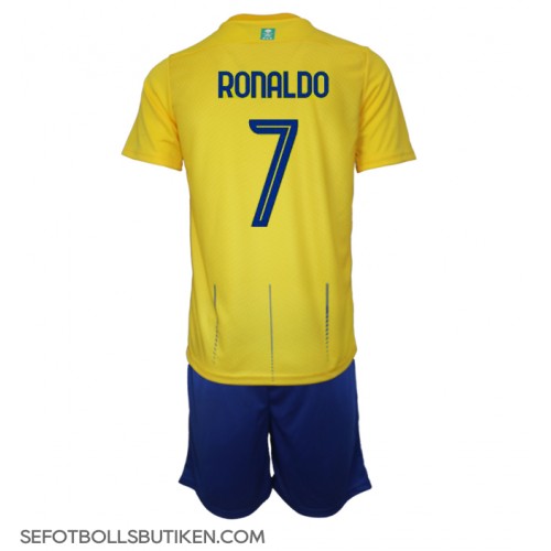 Al-Nassr Cristiano Ronaldo #7 Replika Babykläder Hemma matchkläder barn 2023-24 Korta ärmar (+ Korta byxor)